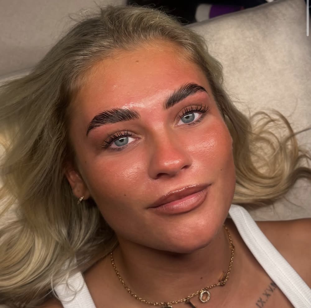 Client with laminated brows and lifted lashes